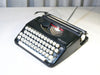 Olympia Splendid 33 black portable typewriter QWERTY
