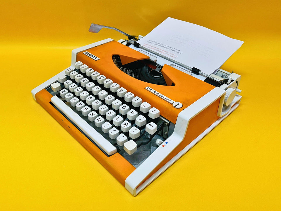 Olympia Traveller De Luxe Typewriter – 1970 Orange Portable Manual Typewriter with Case