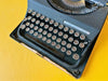 Vintage Invicta 1950s black Italian typewriter decorative display